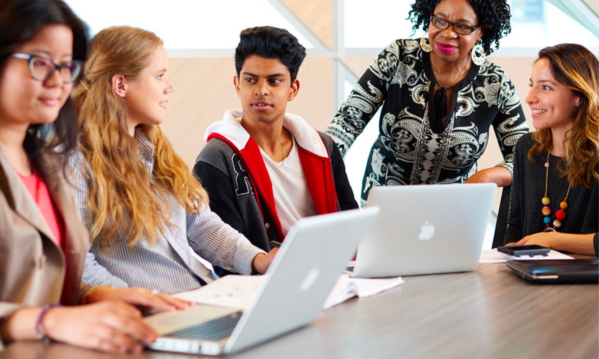 Students in a classroom with their teacher